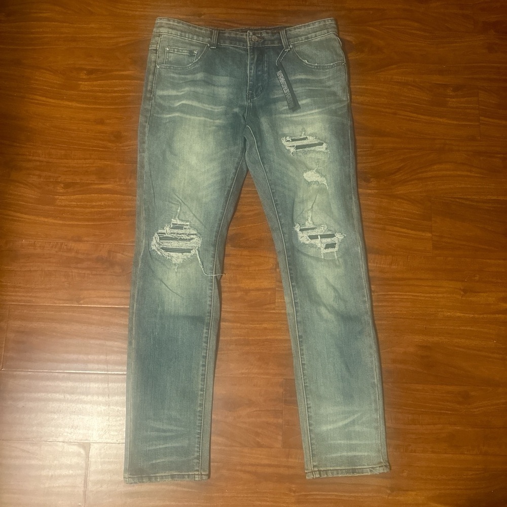 AMIRI Mx1 Light Blue Distressed Skinny Jeans